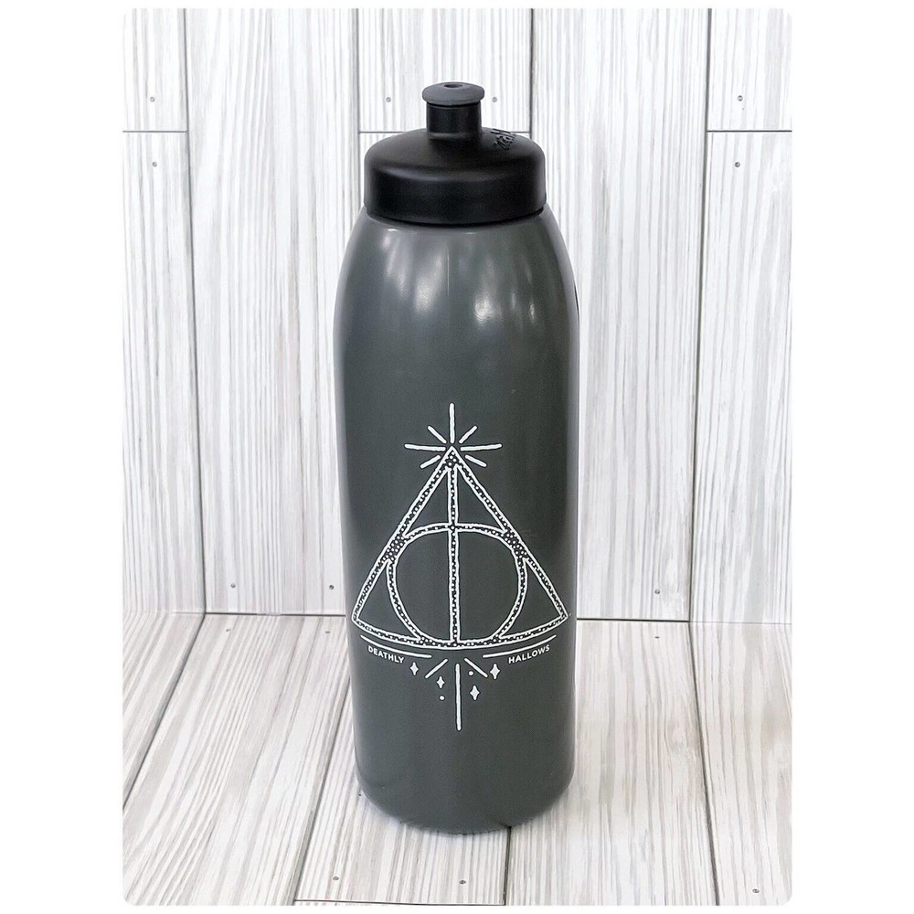 Zak! Harry Potter and The deathly Hallows 32 oz water bottle. wand stone cloak